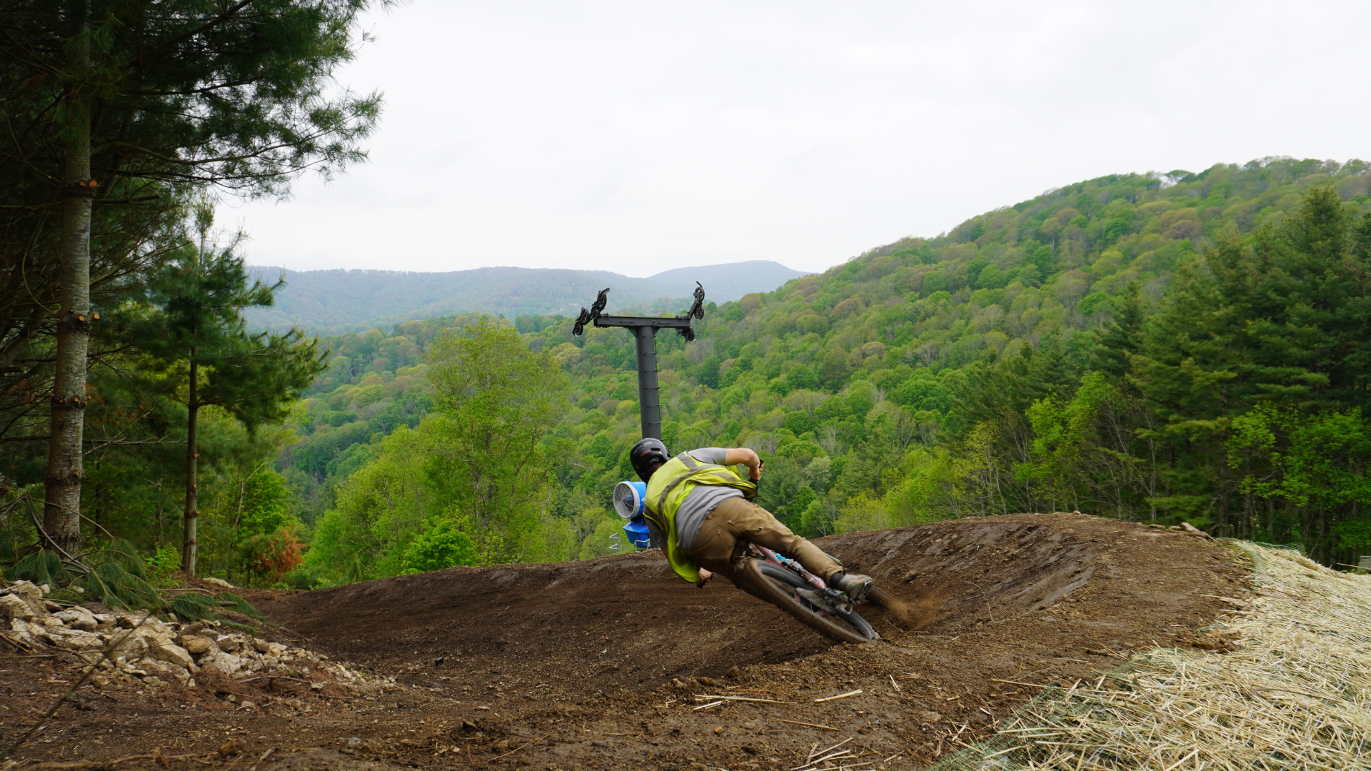 Rider descending a Blue Ridge trail at Hatley Pointe Bike Park